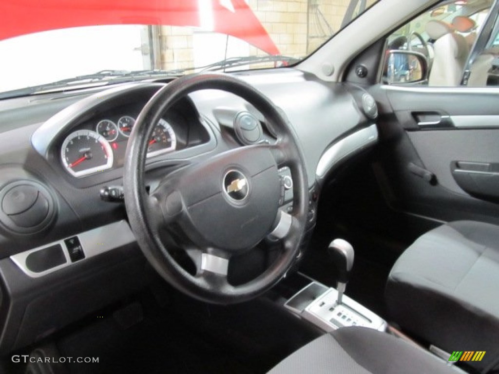 2010 Aveo LT Sedan - Sport Red / Charcoal photo #14