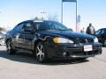 2004 Black Pontiac Grand Am GT Sedan  photo #3