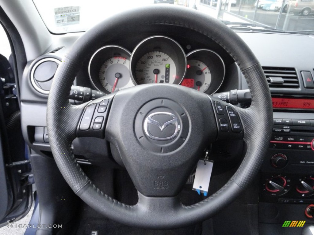 2009 Mazda MAZDA3 i Touring Sedan Steering Wheel Photos