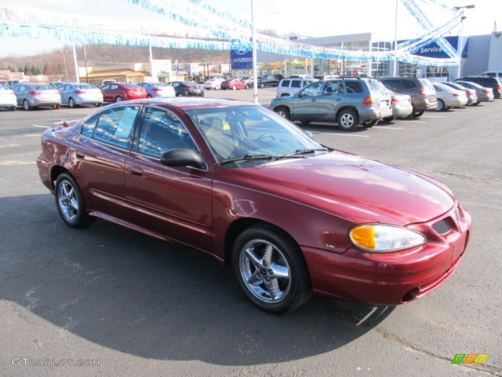 2003 Grand Am SE Sedan - Redfire Metallic / Dark Pewter photo #1