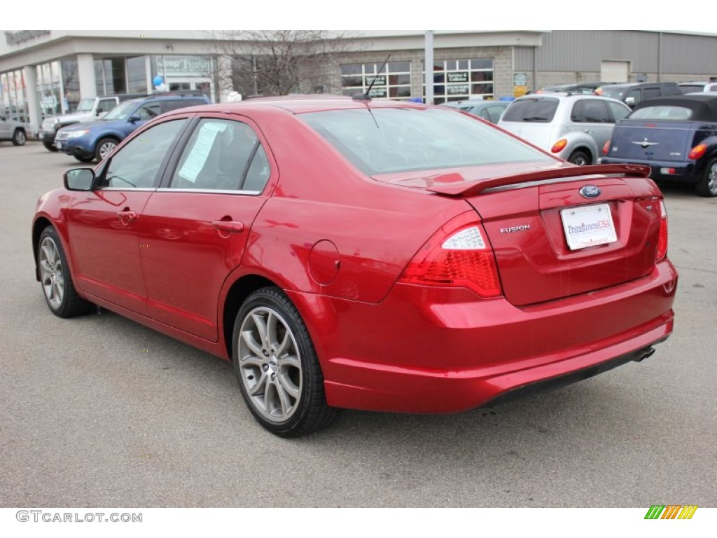 2010 Fusion SE - Red Candy Metallic / Charcoal Black photo #2