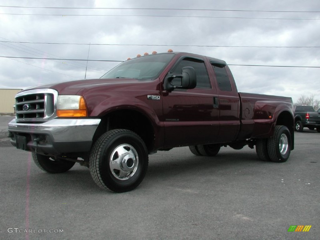 Dark Toreador Red Metallic 2000 Ford F350 Super Duty XLT Extended Cab 4x4 Dually Exterior Photo #61373403