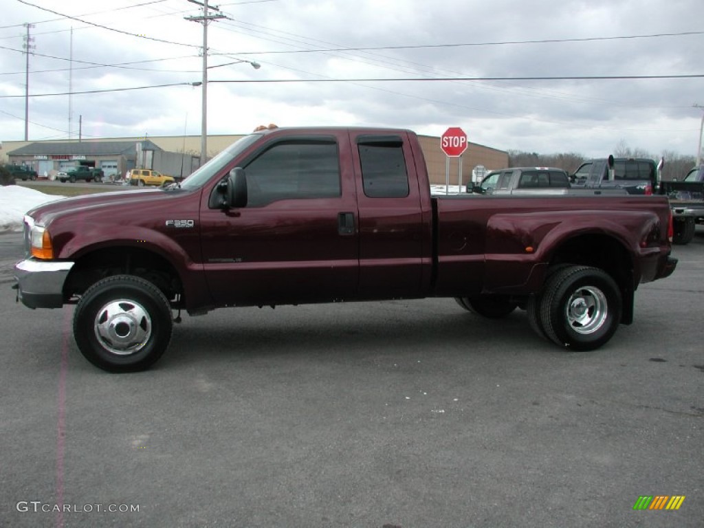 Dark Toreador Red Metallic 2000 Ford F350 Super Duty XLT Extended Cab 4x4 Dually Exterior Photo #61373421