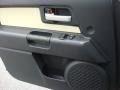 2010 Toyota FJ Cruiser Dark Charcoal/Beige Interior Door Panel Photo