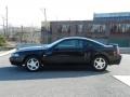 2004 Black Ford Mustang V6 Coupe  photo #2