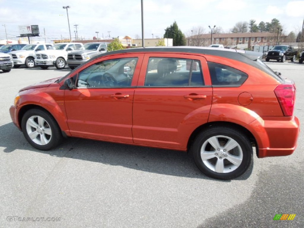 Sunburst Orange Pearl 2010 Dodge Caliber SXT Exterior Photo #61428628