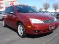 2005 Sangria Red Metallic Ford Focus ZX5 SES Hatchback  photo #1
