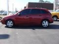 2005 Sangria Red Metallic Ford Focus ZX5 SES Hatchback  photo #7