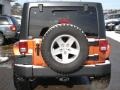 2011 Mango Tango Pearl Jeep Wrangler Unlimited Rubicon 4x4  photo #7