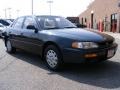 1995 Dark Emerald Green Metallic Toyota Camry LE Sedan  photo #1