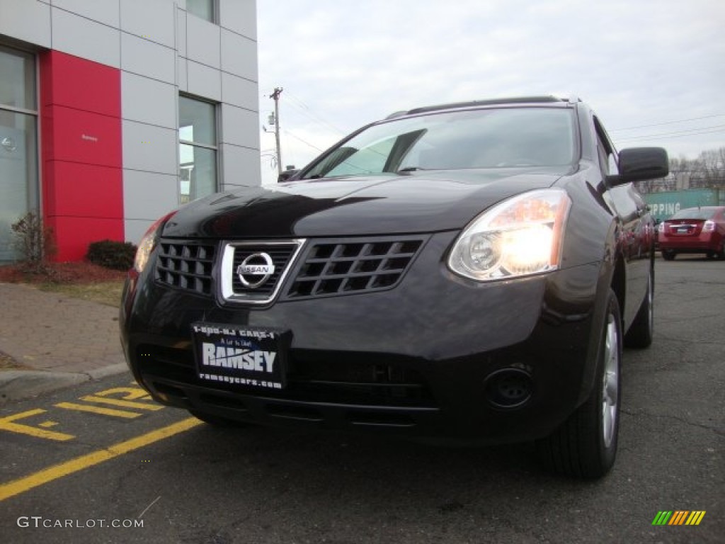 2009 Rogue SL AWD - Wicked Black / Black photo #1