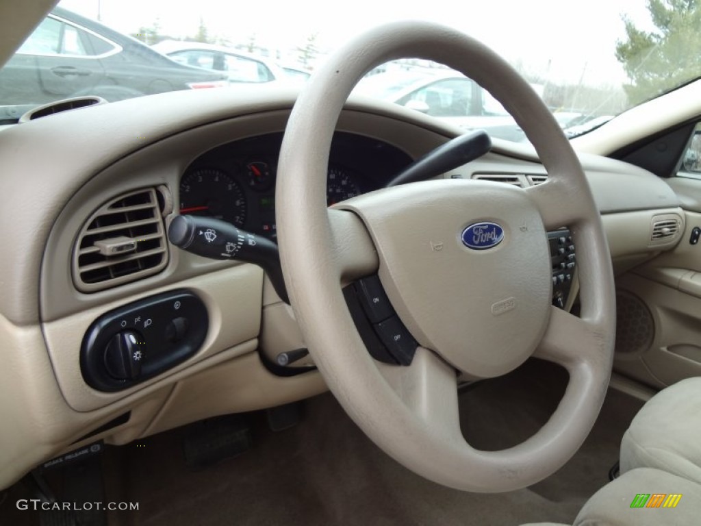 2004 Ford Taurus SE Sedan Medium Parchment Steering Wheel Photo #61572894