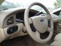 Medium Parchment 2004 Ford Taurus SE Sedan Steering Wheel