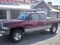 2001 Dark Garnet Red Pearl Dodge Ram 1500 SLT Club Cab 4x4  photo #1