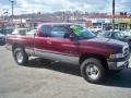 2001 Dark Garnet Red Pearl Dodge Ram 1500 SLT Club Cab 4x4  photo #3