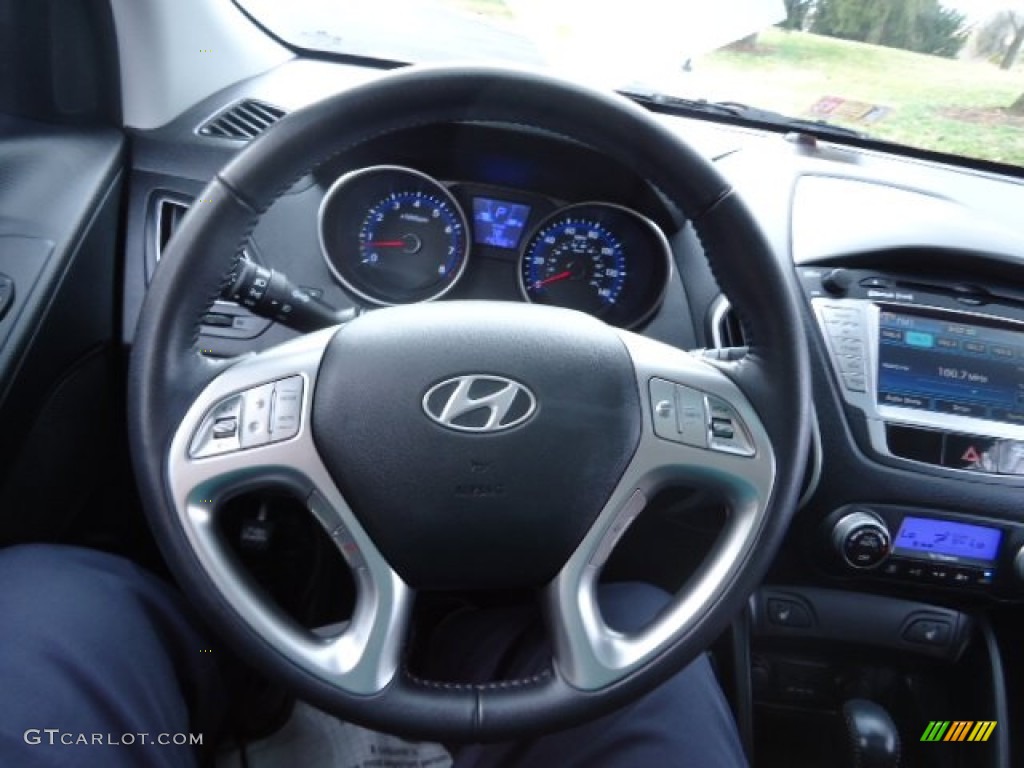 2010 Hyundai Tucson Limited AWD Black/Saddle Steering Wheel Photo #61639187