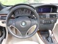 Cream Beige 2010 BMW 3 Series 328i Convertible Steering Wheel
