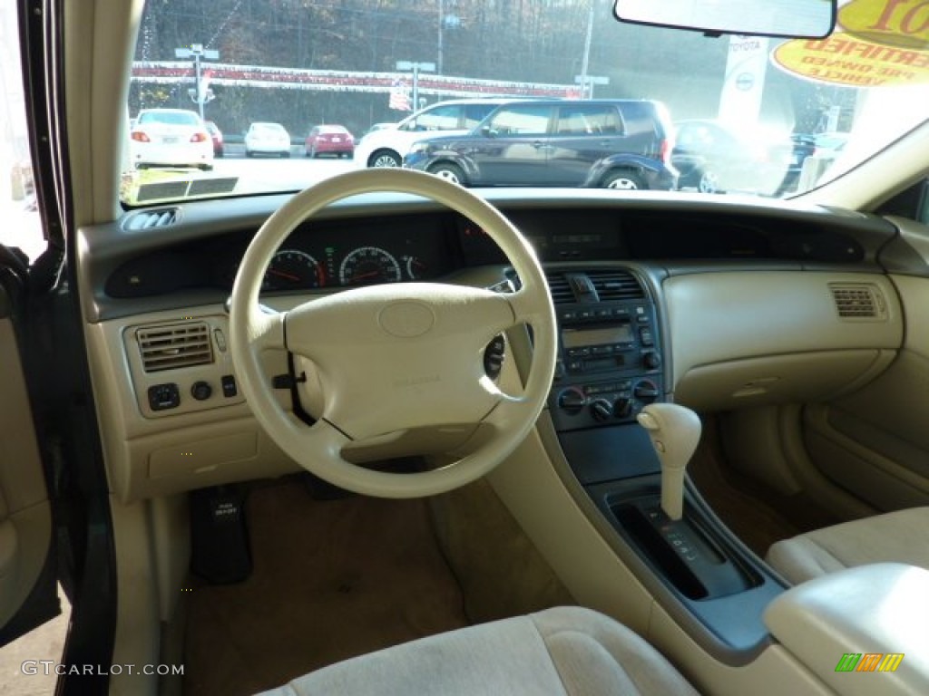 2001 Avalon XL - Woodland Green Pearl / Ivory photo #10