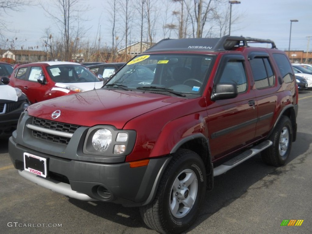 2004 Xterra SE 4x4 - Thermal Red Metallic / Charcoal photo #1