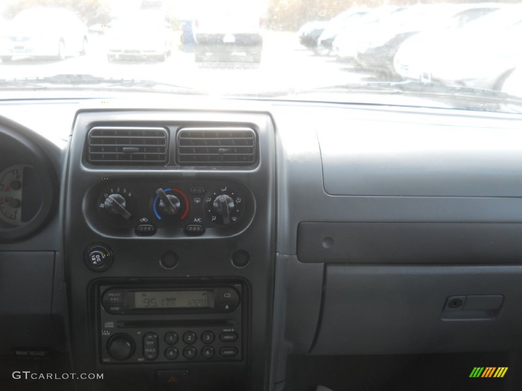 2004 Xterra SE 4x4 - Thermal Red Metallic / Charcoal photo #20