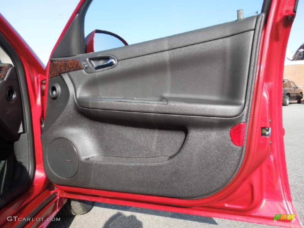 2012 Chevrolet Impala LTZ Ebony Door Panel Photo #61704081