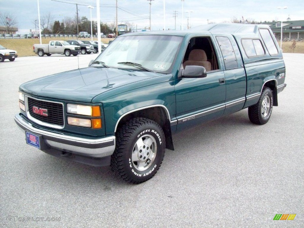 1995 Sierra 1500 SLE Extended Cab 4x4 - Forest Green Metallic / Beige photo #10