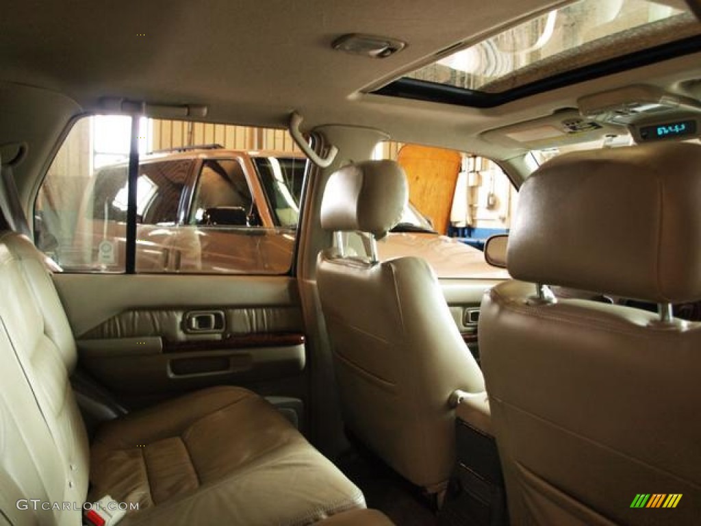 1999 QX4 4x4 - Tuscan Beige Metallic / Beige photo #5