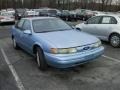 Crystal Blue Frost Metallic 1995 Ford Taurus GL Sedan