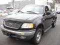 Black 1999 Ford F150 XLT Extended Cab 4x4