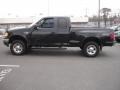 1999 Black Ford F150 XLT Extended Cab 4x4  photo #9