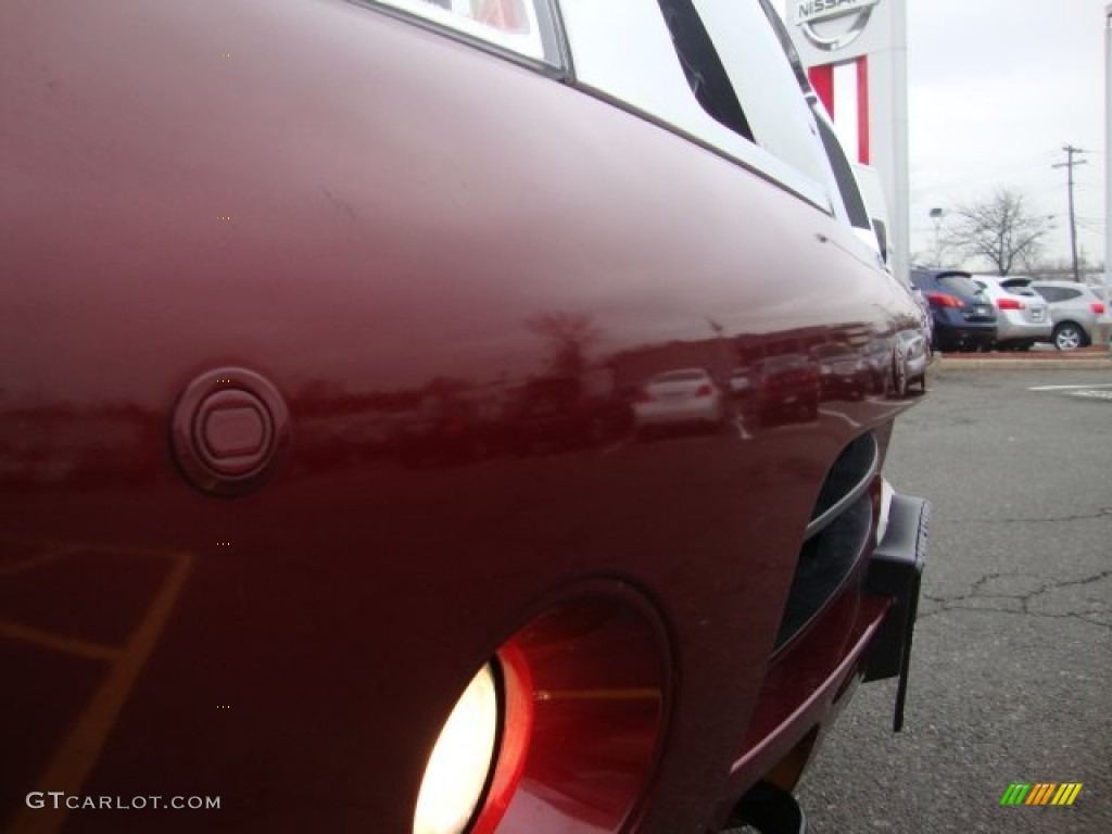 2010 Armada Platinum 4WD - Tuscan Sun Red Pearl / Charcoal photo #15