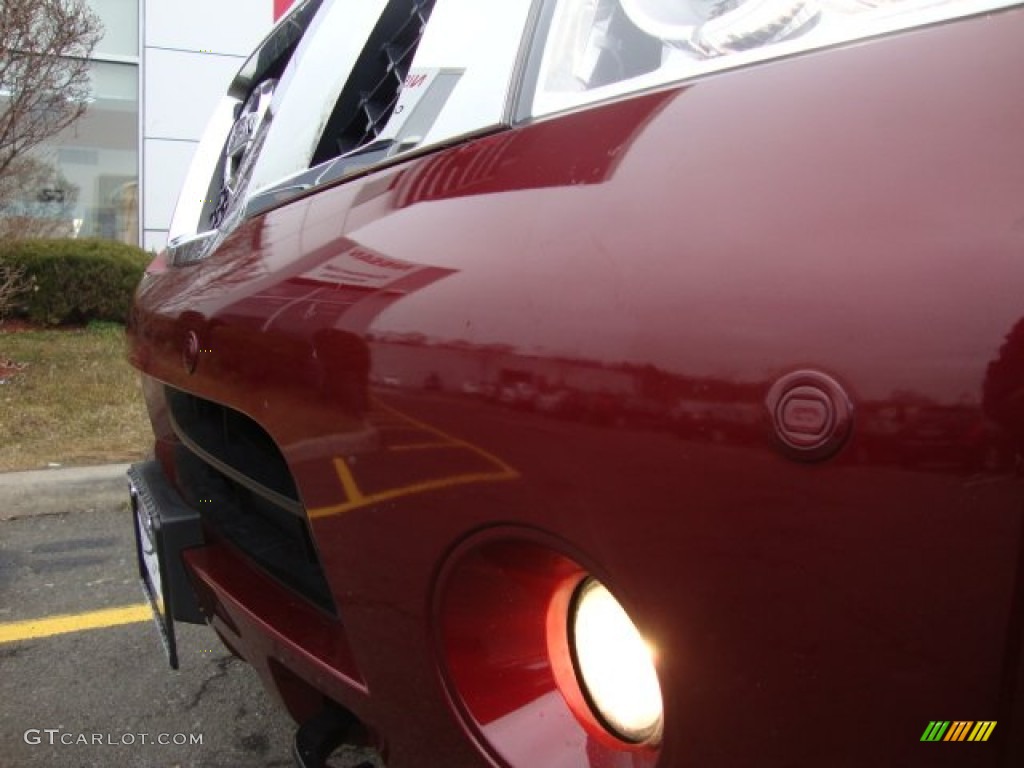 2010 Armada Platinum 4WD - Tuscan Sun Red Pearl / Charcoal photo #16