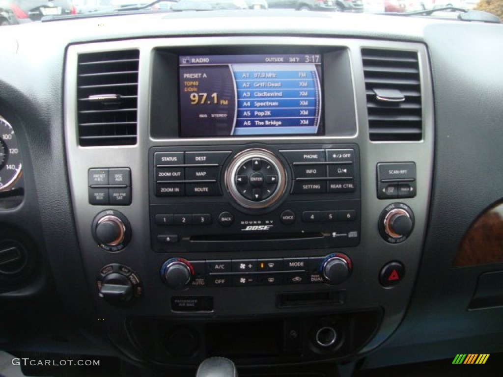 2010 Armada Platinum 4WD - Tuscan Sun Red Pearl / Charcoal photo #26