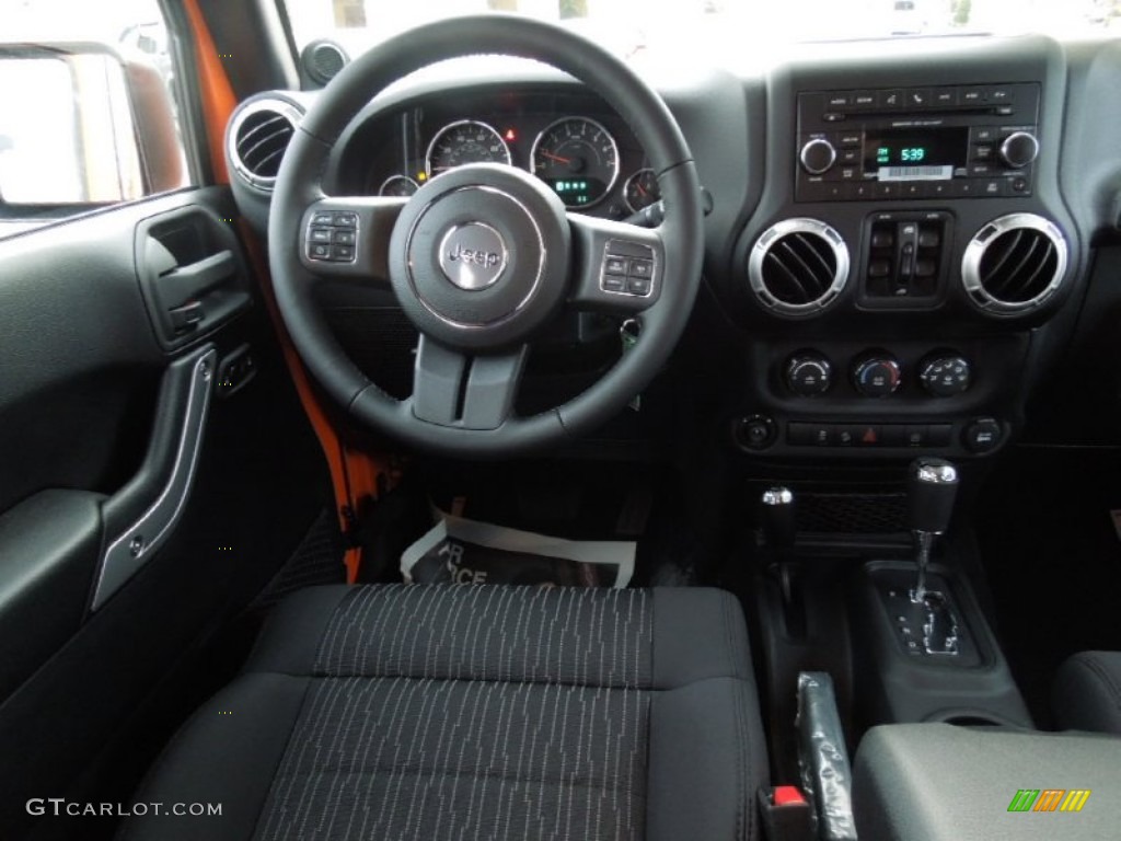 2012 Wrangler Unlimited Sahara 4x4 - Crush Orange / Black photo #16