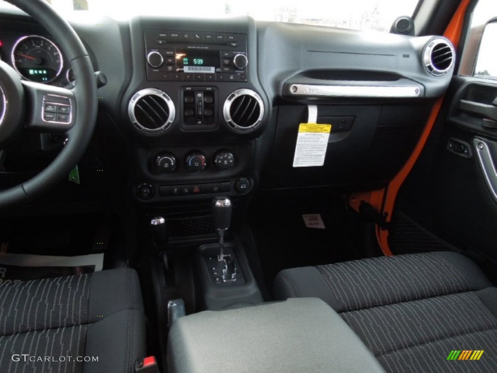 2012 Wrangler Unlimited Sahara 4x4 - Crush Orange / Black photo #17