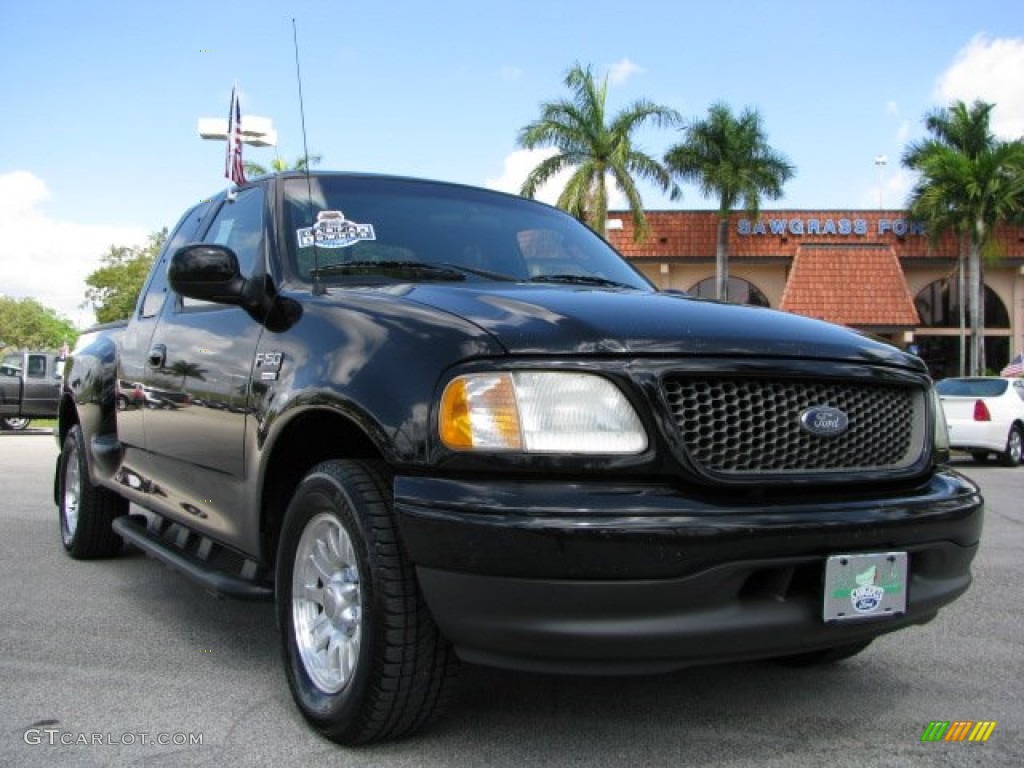 2002 F150 Sport SuperCab - Black / Medium Graphite photo #2