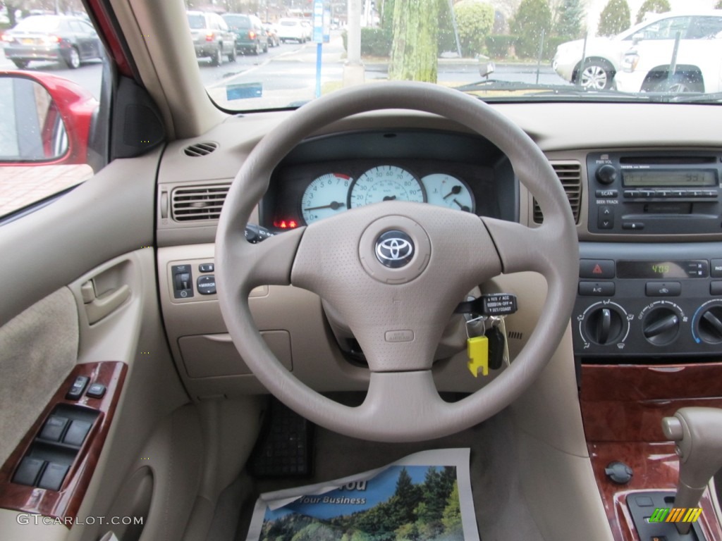 2003 Toyota Corolla LE Pebble Beige Steering Wheel Photo #61851108