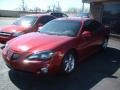 2004 Sport Red Metallic Pontiac Grand Prix GTP Sedan  photo #1