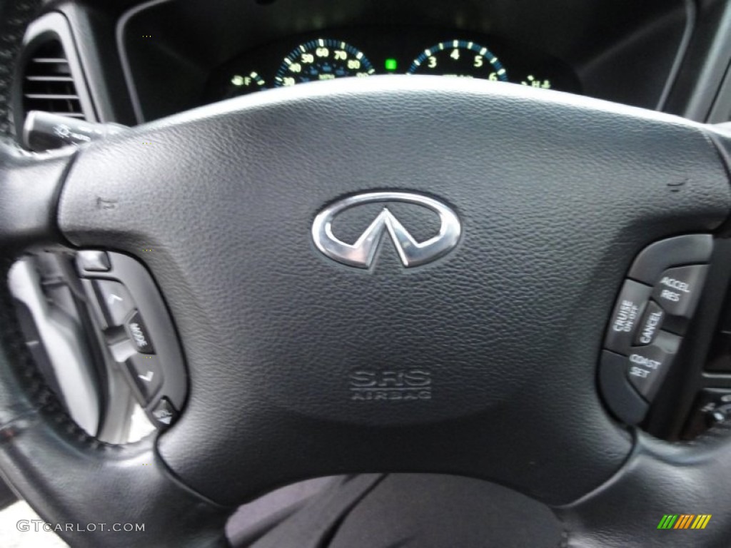 2002 QX4 4x4 - Brilliant Silver Metallic / Graphite photo #49