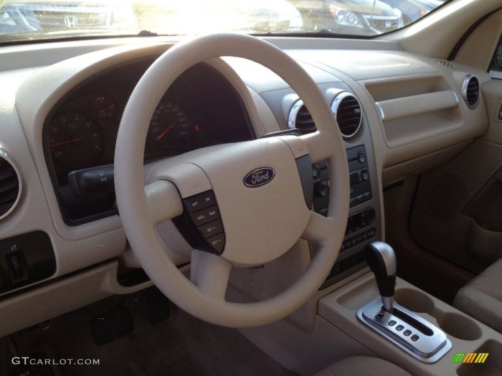 2005 Ford Freestyle SE AWD Pebble Dashboard Photo #61880430