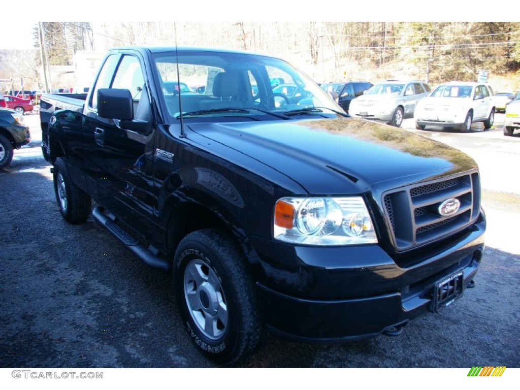 2004 F150 STX Regular Cab 4x4 - Black / Medium/Dark Flint photo #14