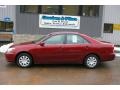 2006 Salsa Red Pearl Toyota Camry LE  photo #2