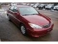 2006 Salsa Red Pearl Toyota Camry LE  photo #16