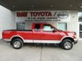 2003 Bright Red Ford F150 XLT SuperCab 4x4  photo #1