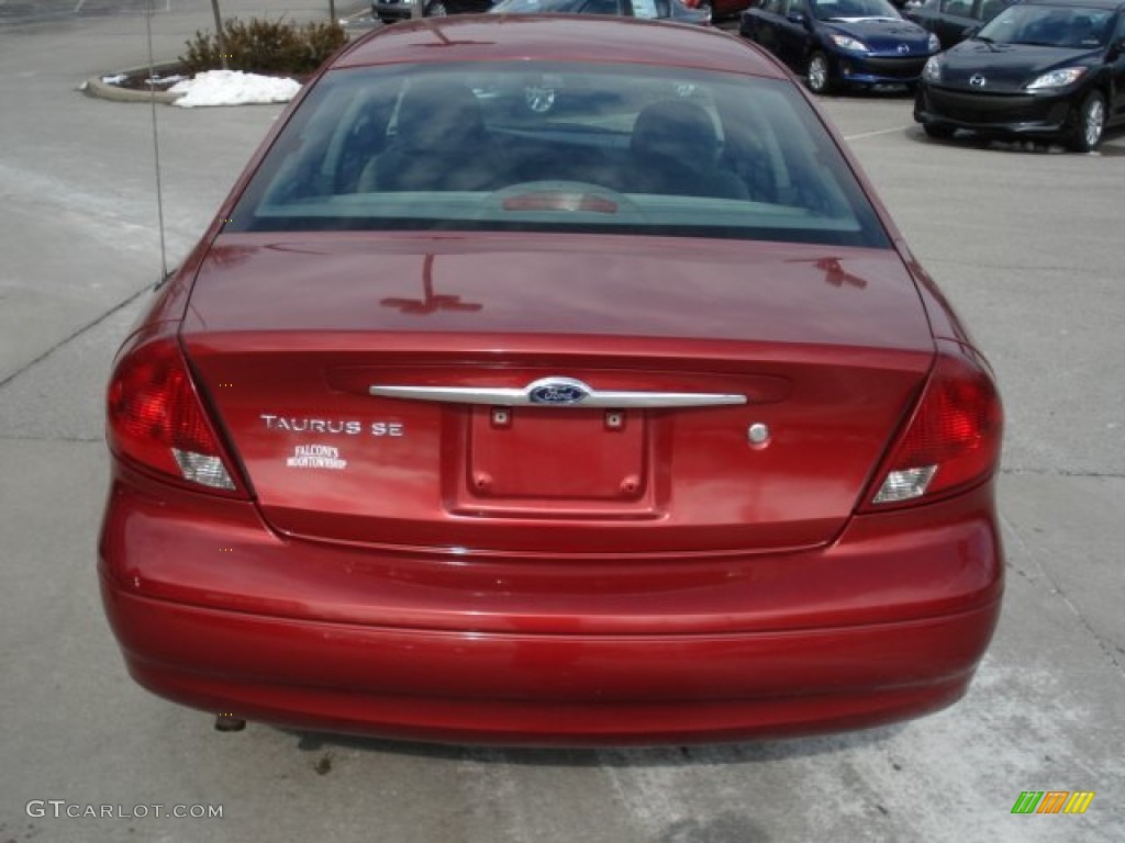 2000 Taurus SE - Toreador Red Metallic / Medium Graphite photo #7