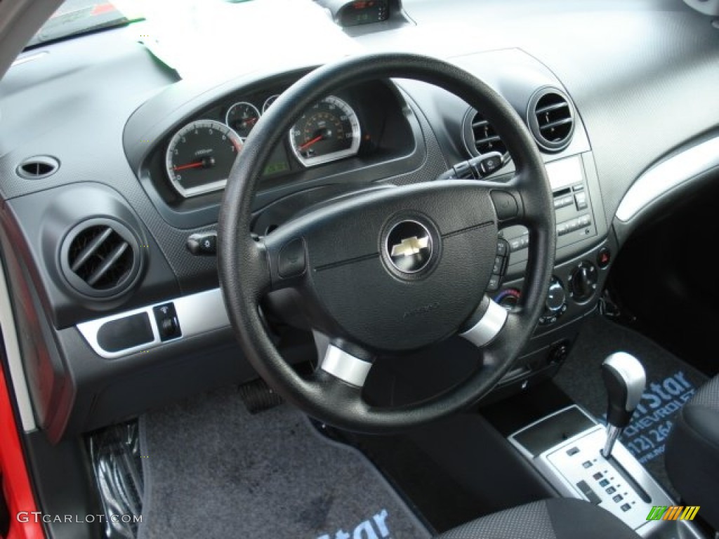 2010 Aveo LT Sedan - Victory Red / Charcoal photo #10