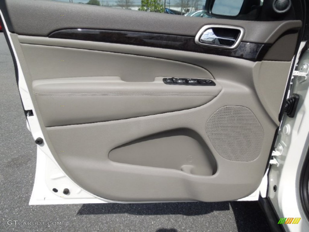 2012 Jeep Grand Cherokee Laredo X Package 4x4 Dark Graystone/Medium Graystone Door Panel Photo #62017281