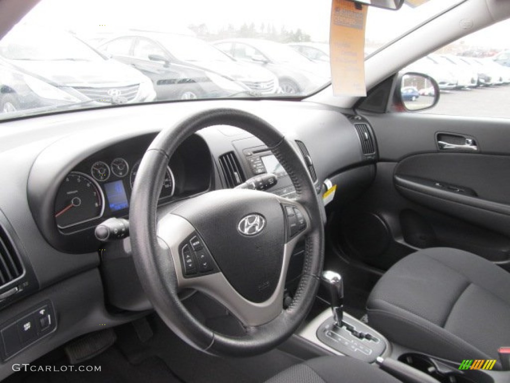 2009 Elantra Touring - Chilipepper Red / Black photo #13