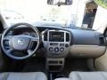 Medium Pebble Beige Dashboard Photo for 2004 Mazda Tribute #62028033