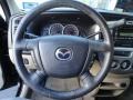 Medium Pebble Beige Steering Wheel Photo for 2004 Mazda Tribute #62028039
